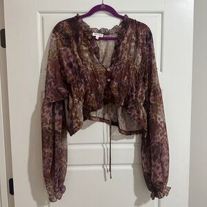 Vestique Sheer Leopard Ruffled Top